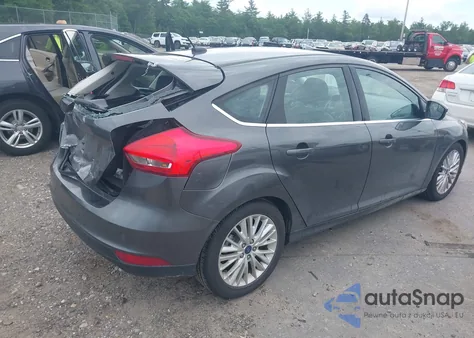 2018 Ford Focus Titanium z USA, uszkodzony, nr VIN 1FADP3N24JL250081